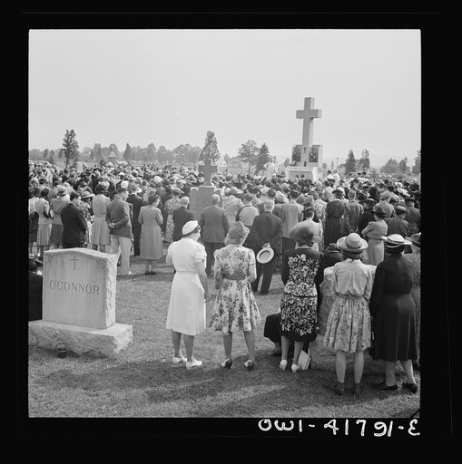 Southington, Connecticut, an American town and its way of life. On All Soul's Day the Catholic congregation is gathering in the Saint Thomas cemetery for an outdoor Mass which in 1942 was officiated by the Reverend Francis J. Mihalek