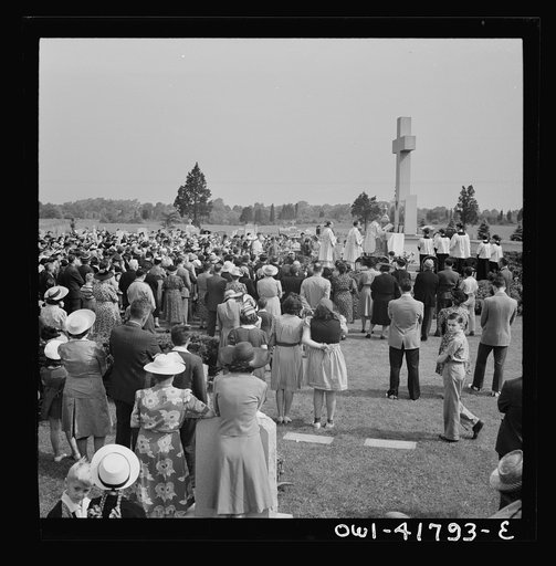 Southington, Connecticut. On All Soul's Day the Catholic congregation is gathering in the Saint Thomas cemetery for an outdoor Mass which was officiated by the Reverend Francis J. Mihalek