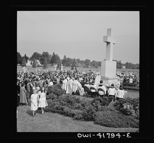Untitled photo, possibly related to: Southington, Connecticut. On All Soul's Day the Catholic congregation is gathering in the Saint Thomas cemetery for an outdoor Mass which in 1942 was officiated by the Reverend Francis J. Mihalek