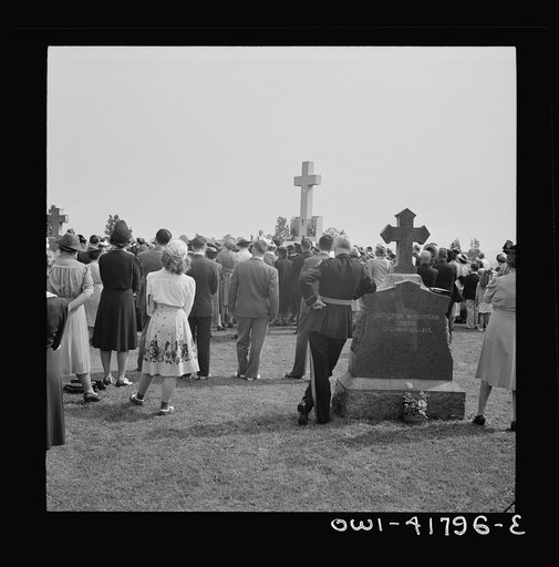 Southington, Connecticut. On All Soul's Day the Catholic congregation is gathering in the Saint Thomas cemetery for an outdoor Mass which in 1942 was officiated by the Reverend Francis J. Mihalek