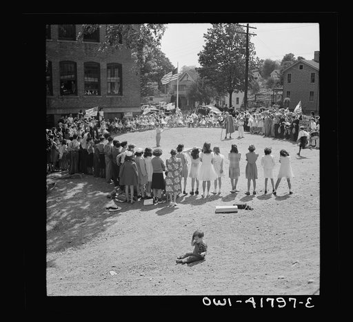 Southington, Connecticut. At Beecher Street School, whose student body consists half of Americans of Italian descent and half of Americans of Polish descent. The Queen of May was Emily Shuvak, of Polish extraction; the king, Philip D'Agostino, of Italian