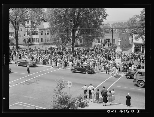 Southington, Connecticut. An American town and its way of life. The Memorial Day parade moving down the main street. The small number of spectators is accounted for by the fact that the town's war factories did not close