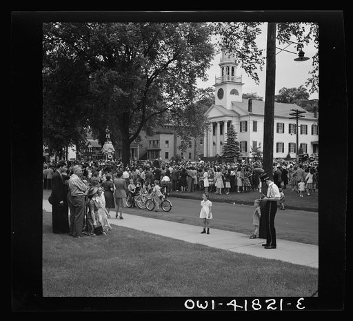 Southington, Connecticut. An American town and its way of life. The Memorial Day parade moving down the main street. The small number of spectators is accounted for by the fact that the town's war factories did not close