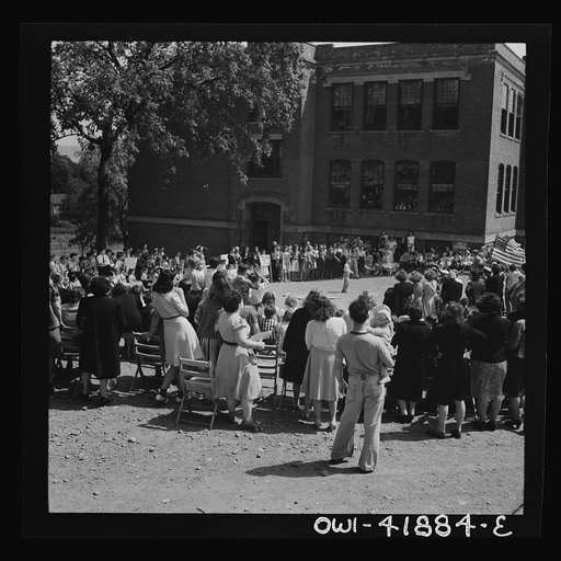 Southington, Connecticut. Young people watching a game