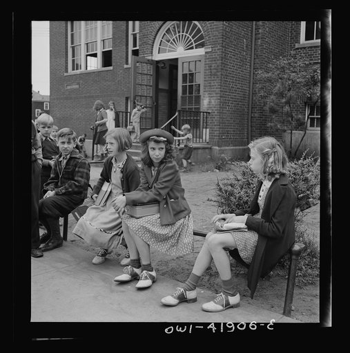 Southington, Connecticut. Young people watching a game