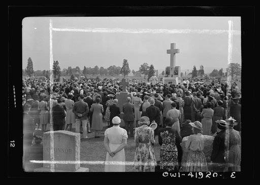 Southington, Connecticut. An American town and its way of life. On All Souls' Day the Catholic congregation is gathering in the Saint Thomas cemetery for an outdoor mass which in 1942 was officiated by the Reverend Francis J. Mihalek