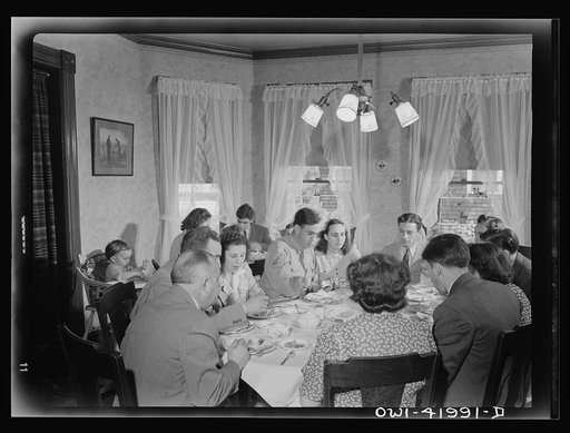 Southington, Connecticut. The family of Ralph Hurlbut. A Sunday dinner honoring Corporal Robert Hurlbut, twenty-one, home on his first furlough from the army. All of the Hurlbuts are on hand for the occasion, including the married and grandchildren. Corporal Robert is not the only Hurlbut serving hi