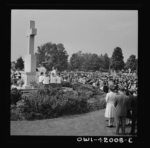 Untitled photo, possibly related to: Southington, Connecticut. On All Souls' Day, the Catholic congregation is gathering in the Saint Thomas Cemetery for an outdoor Mass which in 1942 was officiated by the Reverend Francis J. Mihalek