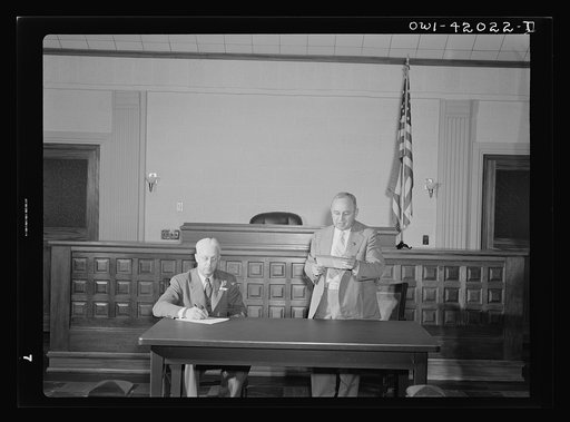 Southington, Connecticut. A Southington town meeting in session. Its chairman is a citizen, Ralph Hurlbut. The people who came to the meeting elected him to be chairman for the night