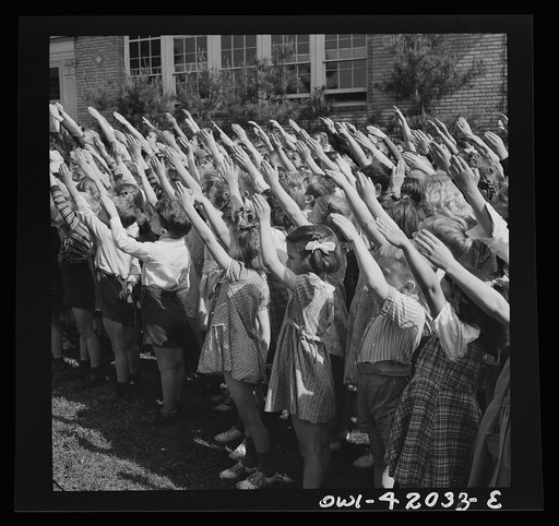 Untitled photo, possibly related to: Southington, Connecticut. School children pledging their allegiance to the flag