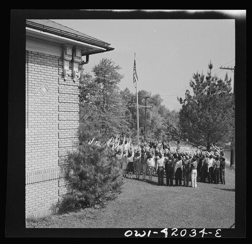 Untitled photo, possibly related to: Southington, Connecticut. School children pledging their allegiance to the flag