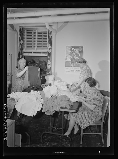 Untitled photo, possibly related to: Southington, Connecticut. Women making clothing for soldiers and for the Allied relief work