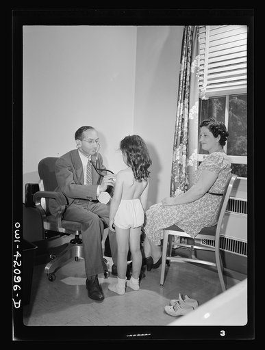 Untitled photo, possibly related to: Southington, Connecticut. At the health center, the people of Southington may receive medical advice and a certain amount of medical care (such as physical checkup, which this girl is receiving) without pay