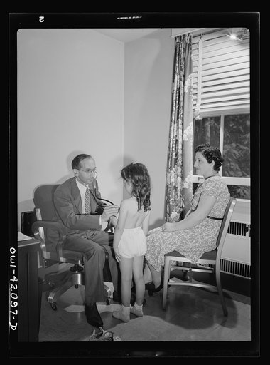 Untitled photo, possibly related to: Southington, Connecticut. At the health center, the people of Southington may receive medical advice and a certain amount of medical care (such as physical checkup, which this girl is receiving) without pay