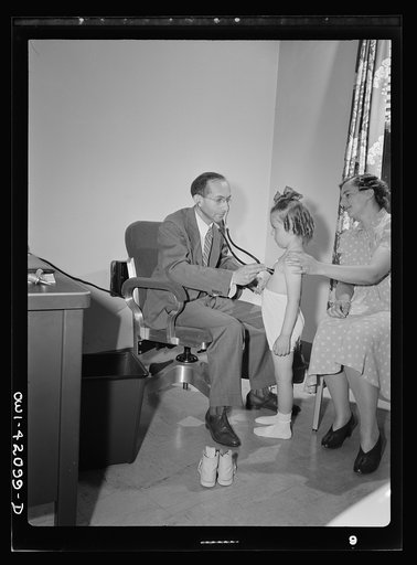 Untitled photo, possibly related to: Southington, Connecticut. At the health center, the people of Southington may receive medical advice and a certain amount of medical care (such as physical checkup, which this girl is receiving) without pay