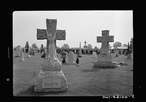 Southington, Connecticut. An American town and its way of life. On Memorial Day the Catholic congregation is gathering in the Saint Thomas cemetery for an outdoor Mass which in 1942 was officiated by the Reverend Francis J. Mihalek