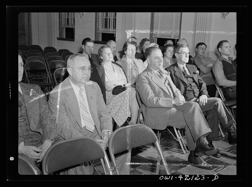 Southington, Connecticut. First Selectman (for 1942) James Simone (left) attending the town meeting in his capacity as citizen. Like other citizens he has one vote on each measure. In his executive capacity he is empowered to act only after the people have given their consent at town meetings. The o
