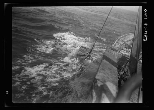 On board a fishing vessel out from Gloucester, Massachusetts. View of choppy waters