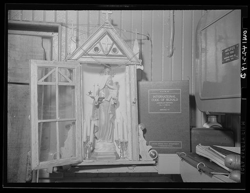 Gloucester, Massachusetts. The "Mother of Good Voyages" statue in Captain John Riberia's [i.e., Ribeiro's] quarters on the fishing trawler "Old Glory"