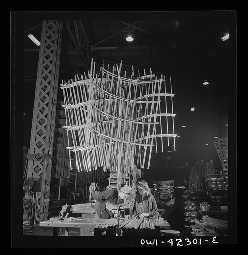 Seattle, Washington. Boeing aircraft plant. Production of B-17F (Flying Fortress) bombing planes. Sections of framework