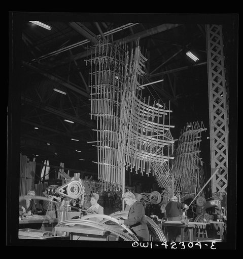 Seattle, Washington. Boeing aircraft plant. Production of B-17F (Flying Fortress) bombing planes. Sections of framework