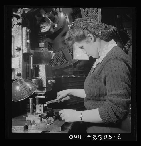 Boeing aircraft plant, Seattle, Washington. Production of B-17F (Flying Fortress) bombing planes. Women making small airplane parts