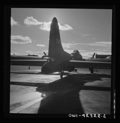 Untitled photo, possibly related to: Production. B-17 heavy bomber. Tail view of a new B-17F (Flying Fortress) bomber ready for flight tests at the airfield of Boeing's Seattle plant. The Flying Fortress has performed with great credit in the South Pacific, over Germany and elsewhere. It is a four-e