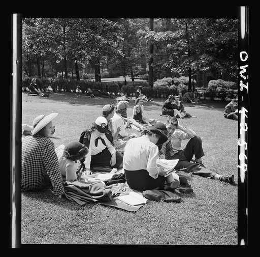 Bethlehem, Pennsylvania. Bach festival. People on the lawn ouside Packer Memorial Chapel during the afternoon performance of the choir