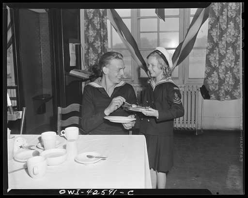 Travers Island, New York. Norwegian Independence Day celebration at the Norwegian gunners' school. Egil Holmberg, Norwegian sailor, and Christine Johansen