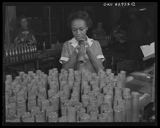 Frankford Arsenal, Philadelphia, Pennsylvania.] Bertha Stallworth, age twenty-one, inspecting the end of a forty millimeter artillery cartridge case at the Frankfort [i.e. Frankford] Arsenal