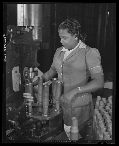 Frankford Arsenal, Philadelphia, Pennsylvania.] Eleanore Bennet, age twenty-five, feeding a stamp press with thirty-seven millimeters cartridge cases at the Frankfort [i.e. Frankford] Arsenal
