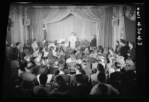 Untitled photo, possibly related to: New York, New York. Merchant marine theatre. Wing canteen. The audience
