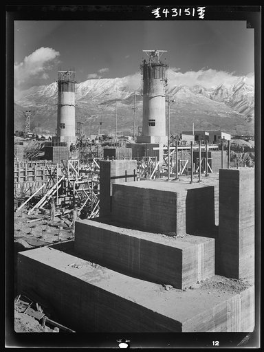 Columbia Steel Company at Geneva, Utah. Partly finished open hearth furnaces and stacks for a steel mill under construction which will soon be producing vitally needed steel