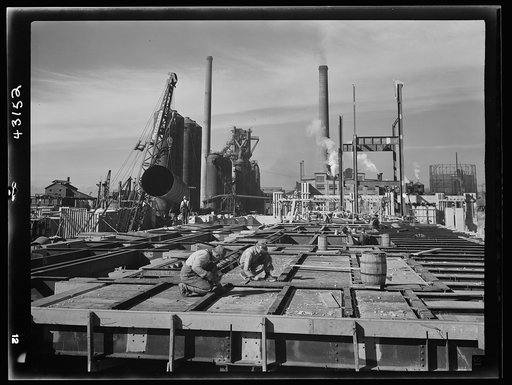 Columbia Steel Company at Geneva, Utah. Steel and concrete go into place rapidly as a new steel mill takes form. The new plant will make important additions to the vast amount of steel needed for the war effort