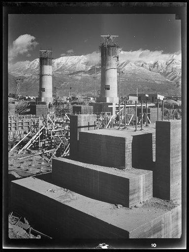 Untitled photo, possibly related to: Columbia Steel Company at Geneva, Utah. Partly finished open hearth furnaces and stacks for a steel mill under construction which will soon be producing vitally needed steel