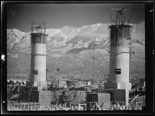 Untitled photo, possibly related to: Columbia Steel Company at Geneva, Utah. Partly finished open hearth furnaces and stacks for a steel mill under construction which will soon be producing vitally needed steel