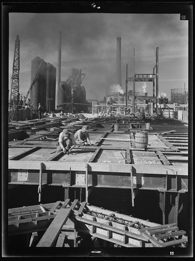 Untitled photo, possibly related to: Columbia Steel Company at Geneva, Utah. Steel and concrete go into place rapidly as a new steel mill takes form. The new plant will make important additions to the vast amount of steel needed for the war effort