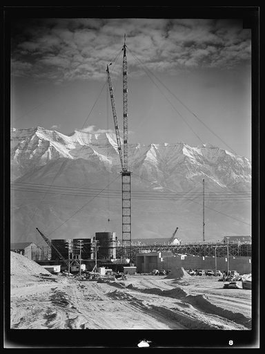 Untitled photo, possibly related to: Columbia Steel Company at Geneva, Utah. Partly finished open hearth furnaces and stacks for a steel mill under construction which will soon be producing vitally needed steel