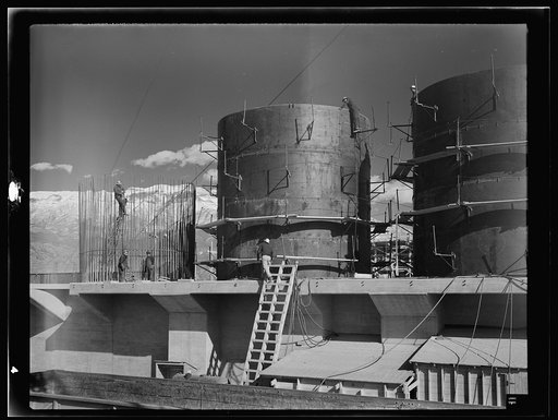 Untitled photo, possibly related to: Columbia Steel Company at Geneva, Utah. The erecting crane is kept busy as blast furnaces take form in a new steel mill under construction which will make important additions to the vast amount of steel needed for the war effort