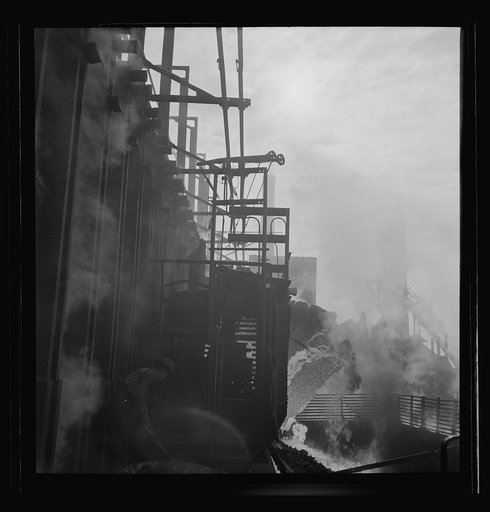 Untitled photo, possibly related to: Columbia Steel Company at Ironton, Utah. Discharging coke oven