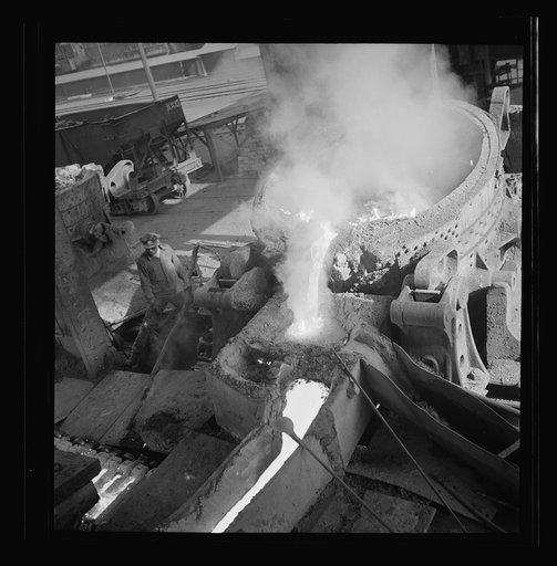 Columbia Steel Company at Ironton, Utah. Pouring a heat of iron