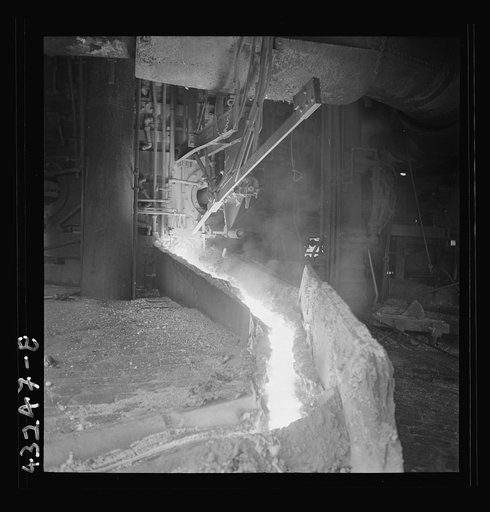 Columbia Steel Company at Ironton, Utah. Pouring a heat of iron