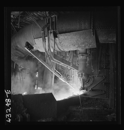 Columbia Steel Company at Ironton, Utah. Inside the cast house of the blast furnace