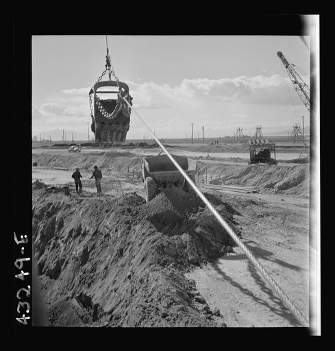 Untitled photo, possibly related to: Columbia Steel Company at Geneva, Utah. Drag lines are working day and night excavating for the building of open hearth furnaces for a new steel mill which will make important additions to the vast amount of steel needed for the war effort