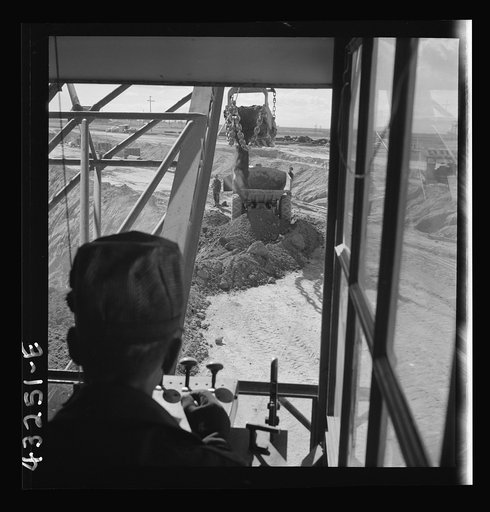 Untitled photo, possibly related to: Columbia Steel Company at Geneva, Utah. Drag lines are working day and night excavating for the building of open hearth furnaces for a new steel mill which will make important additions to the vast amount of steel needed for the war effort