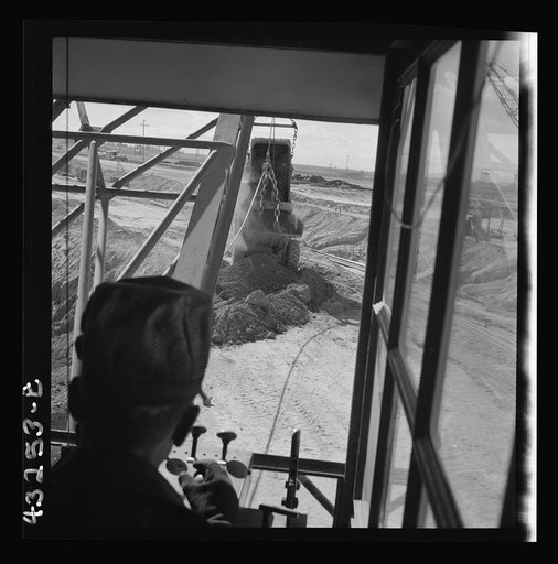 Untitled photo, possibly related to: Columbia Steel Company at Geneva, Utah. Drag lines are working day and night excavating for the building of open hearth furnaces for a new steel mill which will make important additions to the vast amount of steel needed for the war effort