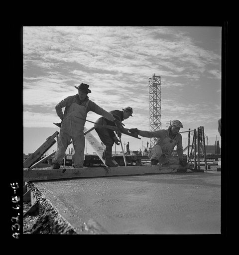 Untitled photo, possibly related to: Columbia Steel Company at Geneva, Utah. Steel and concrete go into place rapidly as a new steel mill takes form. The new plant will make important additions to the vast amount of steel needed for the war effort