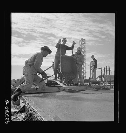 Columbia Steel Company at Geneva, Utah. Steel and concrete go into place rapidly as a new steel mill takes form. The new plant will make important additions to the vast amount of steel needed for the war effort