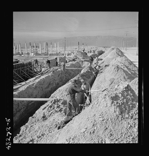 Columbia Steel Company at Geneva, Utah. Steel and concrete go into place rapidly as a new steel mill takes form. The new plant will make important additions to the vast amount of steel needed for the war effort