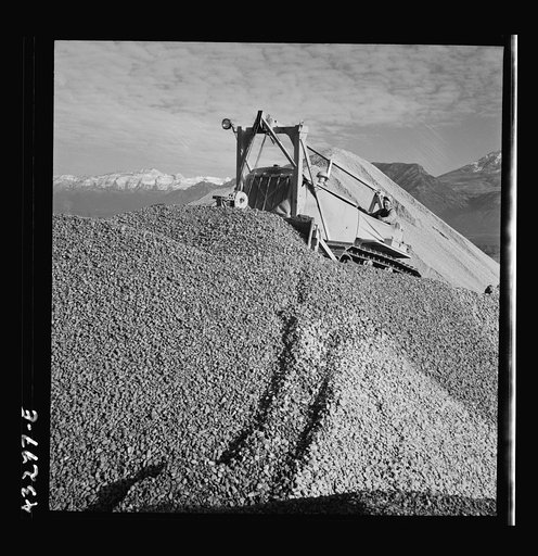 Columbia Steel Company at Geneva, Utah. Bulldozer handling gravel for concrete during the construction of a new steel mill which will make important additions to the vast amount of steel needed for the war effort